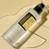 COSRX Advanced Snail Mucin 96 Power Essence bottle on beige background with essence texture